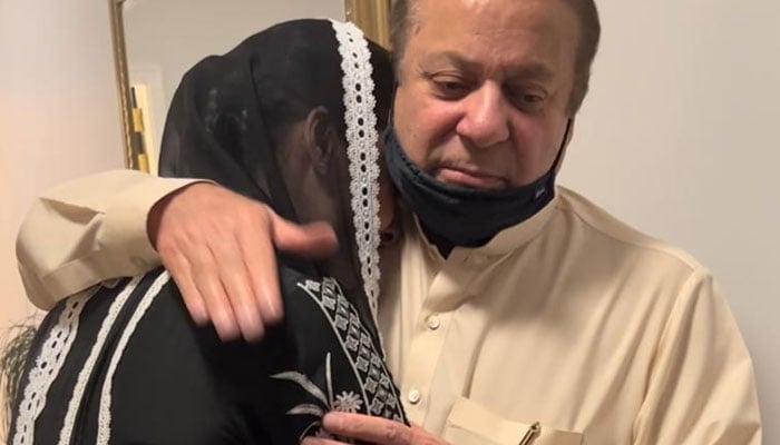 Maryam is received by her father, Nawaz Sharif at the Avenfield Apartments on October 7, 2022. Twitter/PMLN