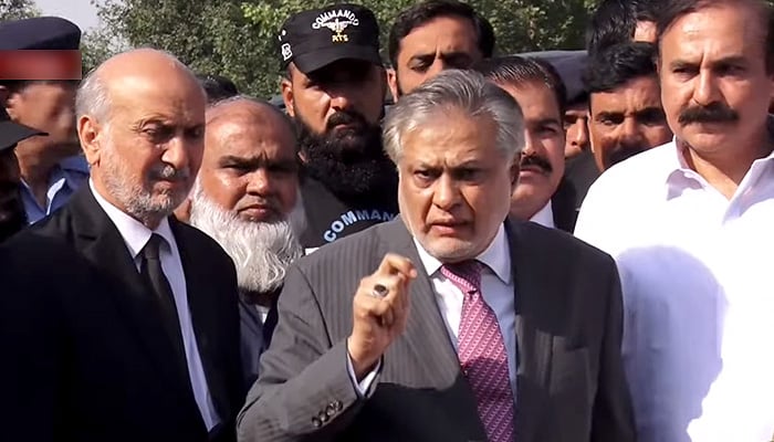 Finance Minister Ishaq Dar speaks to the media after appearing before an accountability court in Islamabad today. — Screengrab