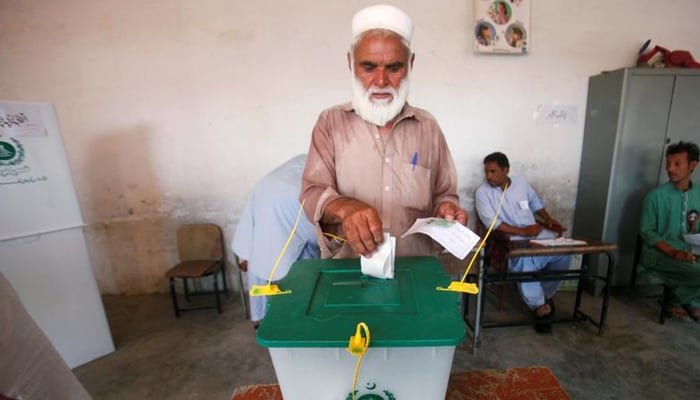 A voter casts his vote at a polling station during the first provincial elections in Jamrud, Pakistan July 20, 2019. — Reuters