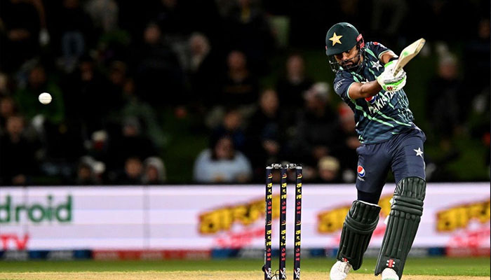 Pakistan´s Babar Azam plays a shot during the second cricket match between New Zealand and Pakistan in the Twenty20 tri-series at Hagley Oval in Christchurch on October 8, 2022. — AFP