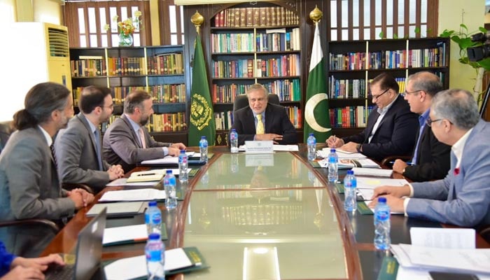 Federal Minister for Finance and Revenue Ishaq Dar meets WorldBank Country Director Najy Benhassine at Finance Division on Saturday (October 8, 2022). — Twitter/FinMinistryPak