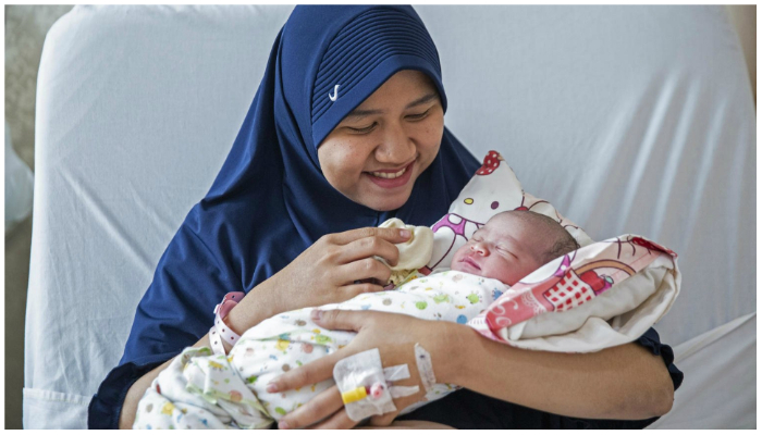 Representational image of a mother holding her newborn baby. — Twitter/Unicef