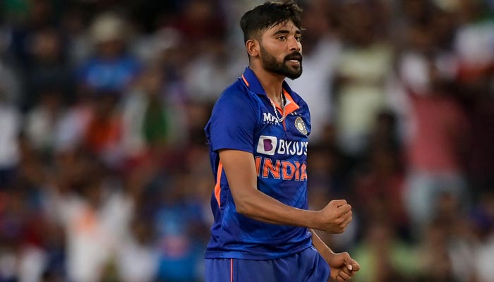Indias Mohammed Siraj celebrates after taking the wicket of South Africas captain Keshav Maharaj (not pictured) during the second one-day international (ODI) cricket match between India and South Africa at the Jharkhand State Cricket Association (JSCA) stadium in Ranchi on October 9, 2022. — AFP