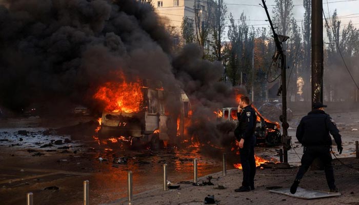Cars are seen on fire after Russian missile strikes, as Russias attack continues, in Kyiv, Ukraine October 10, 2022. — Reuters