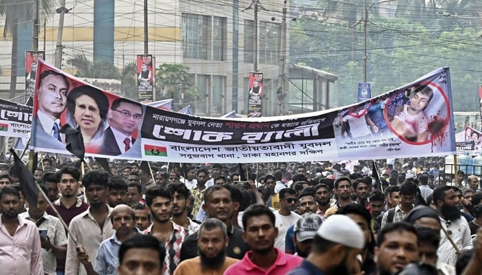 Activists of the Bangladesh Nationalist Party (BNP) take part in a protest march in Dhaka on September 7, 2022, against the recent killing of one of its activists in a police shooting in the central Bangladesh industrial city of Narayanganj. — AFP