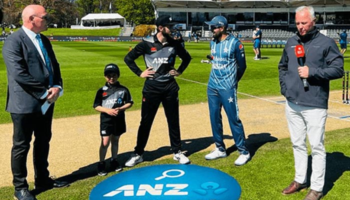 Pakistan captain Babar Azam and Kiwi skipper Kane Williamson are seen at the toss along with match officials at Christchurch stadium on Tuesday. — PCB