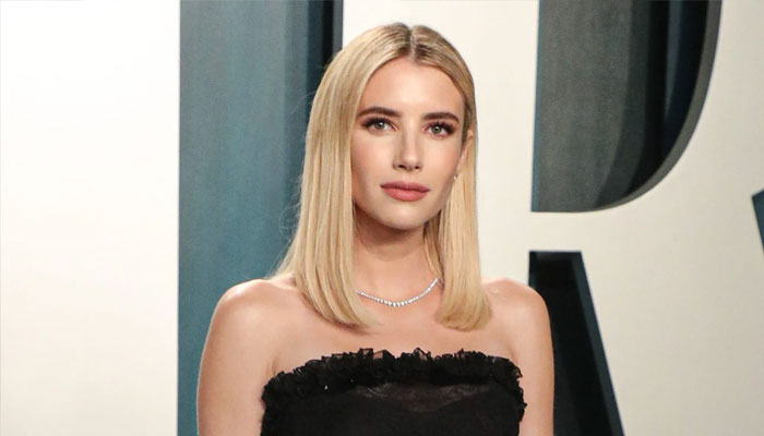 Emma Roberts packs on PDA with new beau