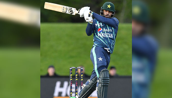 Pakistan´s Mohammad Nawaz plays a shot during the Twenty20 tri-series cricket match between Pakistan and Bangladesh at Hagley Oval in Christchurch on October 13, 2022. — AFP