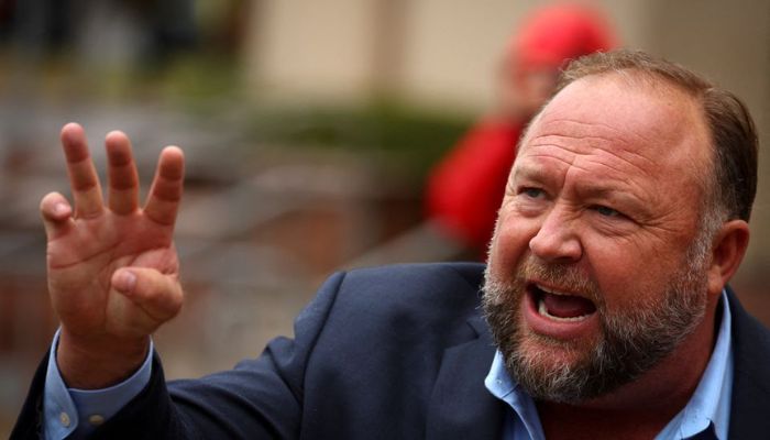 Infowars founder Alex Jones speaks to the media after appearing at his Sandy Hook defamation trial at Connecticut Superior Court in Waterbury, Connecticut, U.S., October 4, 2022.— Reuters