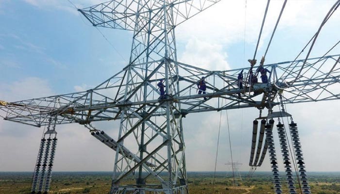 Power outage yet to be controlled, situation to be clear after 3pm: sources - Financeupdates 2 Men work on electric pylons — Twitter