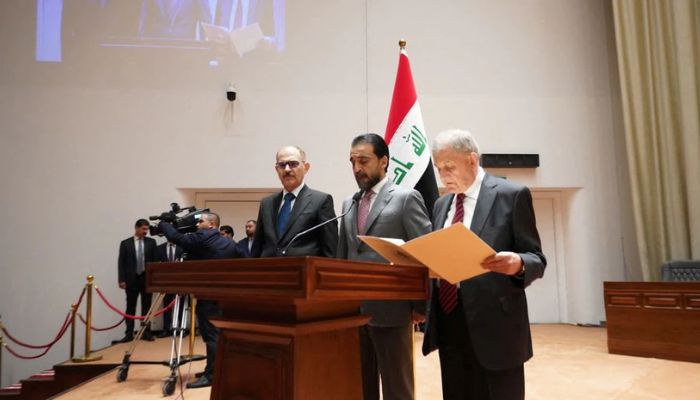 Abdul Latif Rashid takes his oath of office in front of Iraqi lawmakers in Baghdad, Iraq, October 13, 2022.— Reuters