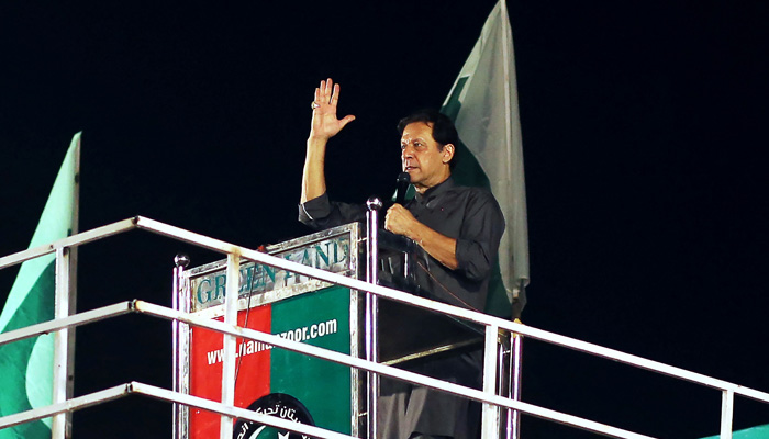 Former Pakistans prime minister Imran Khan delivers a speech in a rally in Multan on September 8, 2022. -AFP