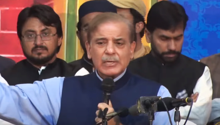 Prime Minister Shehbaz Sharif addresses the Mufti Mehmood conference in Lahore, on October 15, 2022. — YouTube/HumNewsLive