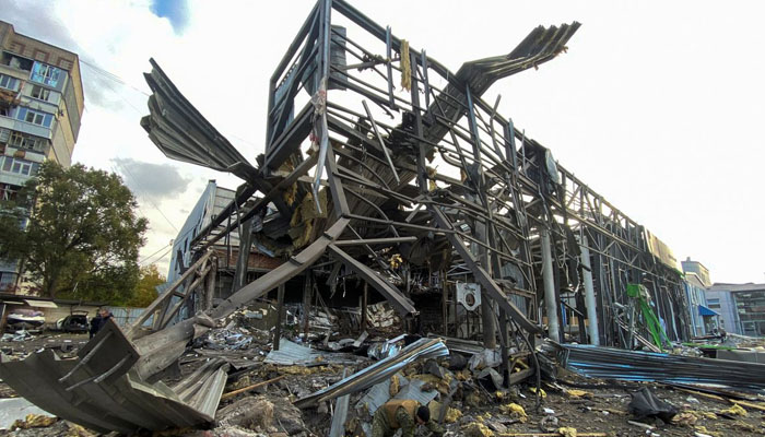 A view shows an office building of a car retailer destroyed during a Russian missile attack in Zaporizhzhia, Ukraine October 11, 2022. —REUTERS/Sergiy Chalyi