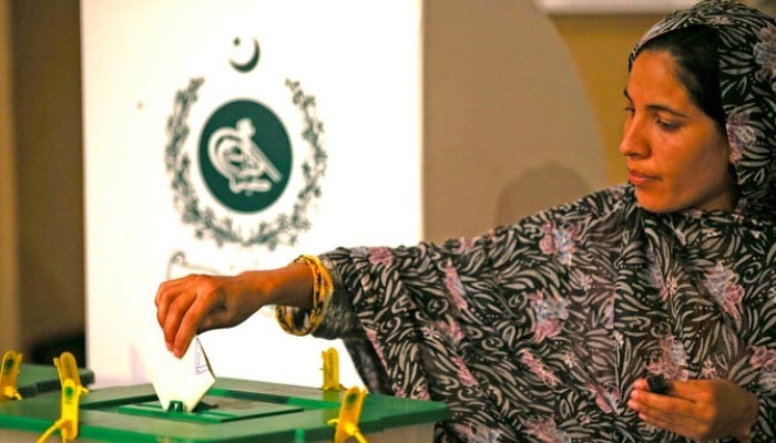 A woman casts her vote during the 2018 General Elections in Pakistan. — Reuters/File