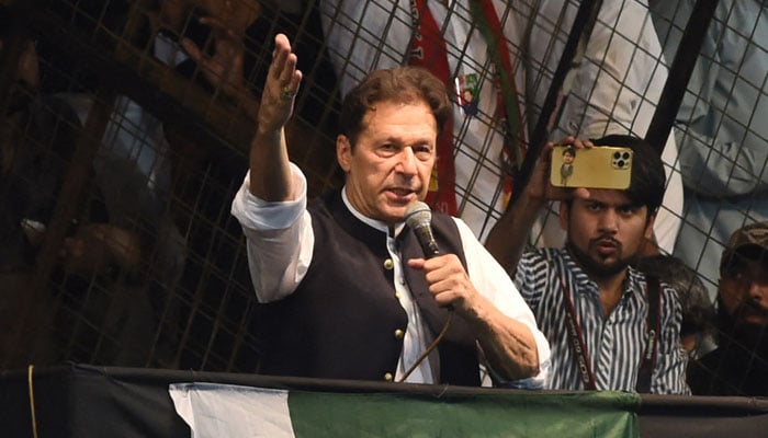 PTI Chairman Iman Khan addressing party supporters. — AFP/File