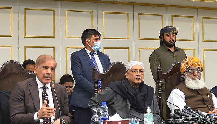 (Left to right) Prime Minister Shahbaz Sharif, PPP Co-chairman Asif Ali Zardari (C), and JUI-F chief Maulana Fazlur Rehman hold a press conference in Islamabad, on March 8, 2022. — AFP/ Farooq Naeem