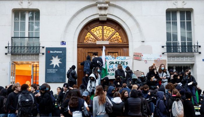 French students block the entrance of the Lycee Montaigne high school to protest as part of a nationwide day of strike in Paris, France, October 18, 2022.— Reuters