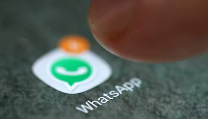 Illustration of WhatsApps logo on a smartphone. — Reuters/File