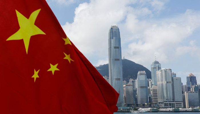 The Chinese national flag is seen in front of the financial district Central on the Chinese National Day in Hong Kong, China October 1, 2022.— Reuters