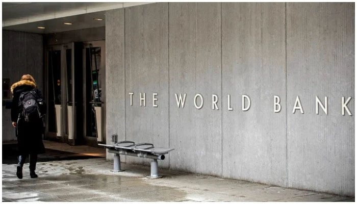 A person enters the building of the Washington-based global development lender, The World Bank Group, in Washington. — AFP