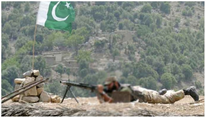 Image showing a Pakistan Army soldier taking a position before opening fire. — ISPR