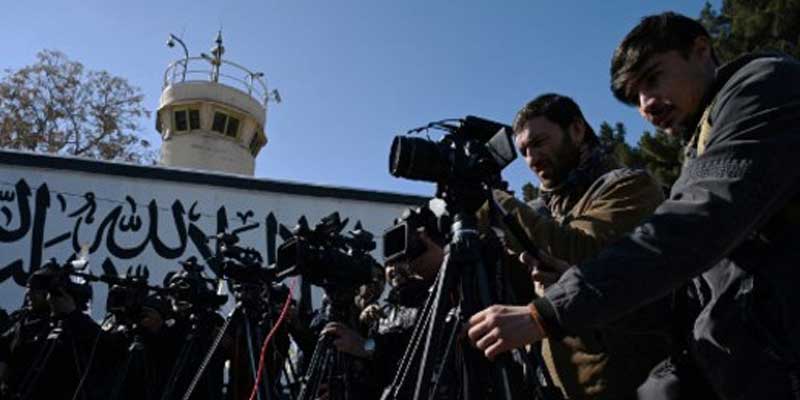 Afghan journalists prepare to cover an event in Afghanistan. — AFP/File