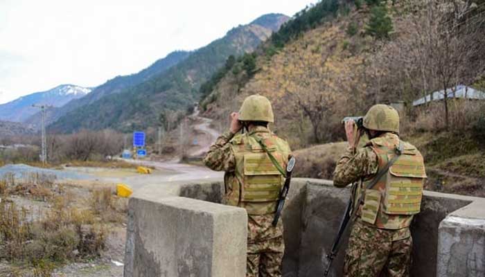 Pakistan military soldiers stand guard at the Line of Control. — Reuters/File