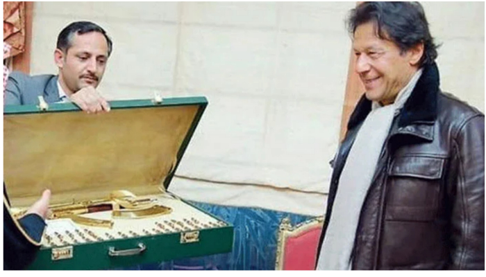 Former prime minister Imran Khan looking at the Toshakhana gifts he received during his tenure. — Twitter/ File