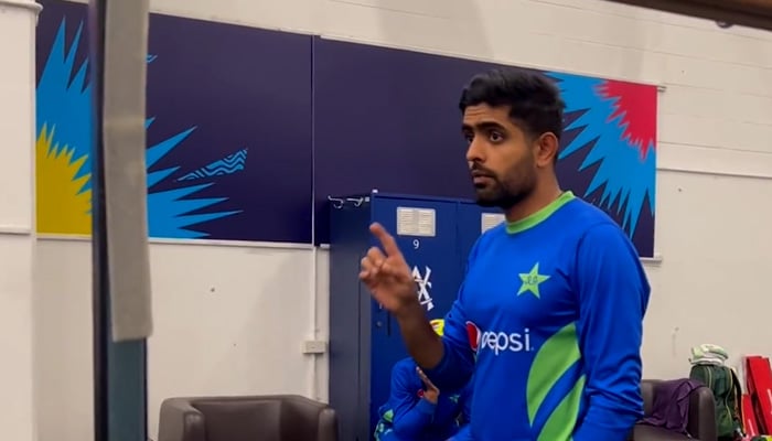 Pakistan captain Babar Azam speaks to players in the dressing room after the match against India. —screengrab