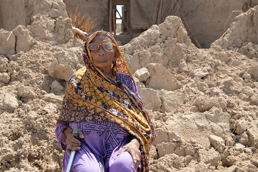 Shamal (a widow), displaced from her home village, is now living in a tent in the town of Mirpur with her two sons and 12 grandchildren. — Helpage