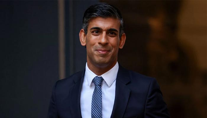New leader of Britains Conservative Party Rishi Sunak stands outside the partys headquarters in London, Britain, October 24, 2022. — Reuters
