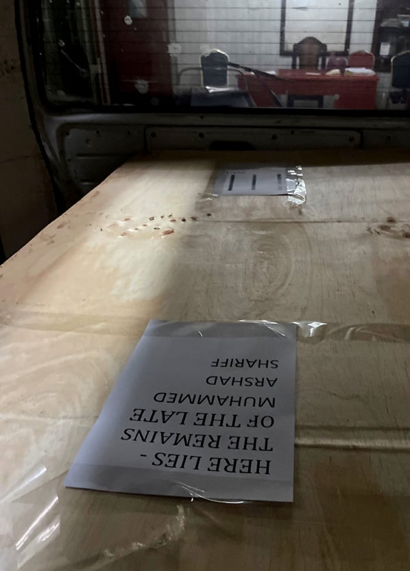 The wooden coffin containing the body of Pakistani journalist Arshad Sharif, who was shot dead when police hunting car thieves opened fire on the vehicle he was traveling in as it drove through their roadblock without stopping, is loaded into a courtesy van at the Chiromo mortuary in Nairobi, Kenya, October 24, 2022. -Reuters