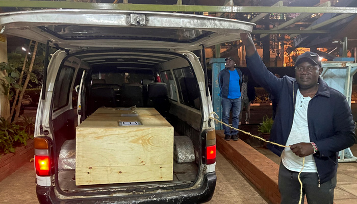 The wooden coffin containing the body of Pakistani journalist Arshad Sharif, who was shot dead when police hunting car thieves opened fire on the vehicle he was traveling in as it drove through their roadblock without stopping, is loaded into a courtesy van at the Chiromo mortuary in Nairobi, Kenya, October 24, 2022. —Reuters