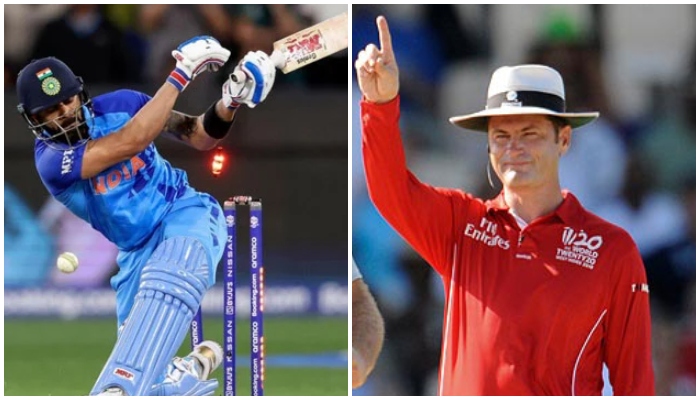 Indian cricketer Virat Kohli (L) and Australian umpire Simon Taufel.  — AFP/File