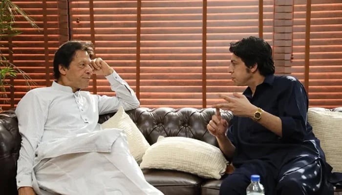 Former federal minister Faisal Vawda (right) and PTI Chairman Imran Khan. — Twitter/File