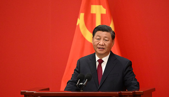 China´s President Xi Jinping speaks after introducing members of the Chinese Communist Party´s new Politburo Standing Committee, the nation´s top decision-making body, in the Great Hall of the People in Beijing on October 23, 2022. — AFP