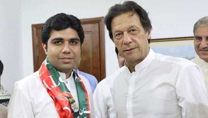 PTI MPAKhurram Sohail Khan Laghari (L) stands with PTI Chairman Imran Khan. — Twitter/File