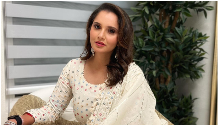 Sania Mirza posing in an elegant off-white outfit. — Instagram/mirzasaniar