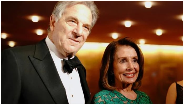 US House Speaker Nancy Pelosi, pictured with husband Paul in 2019, was not in at the time of the attack. — Weekend Australian