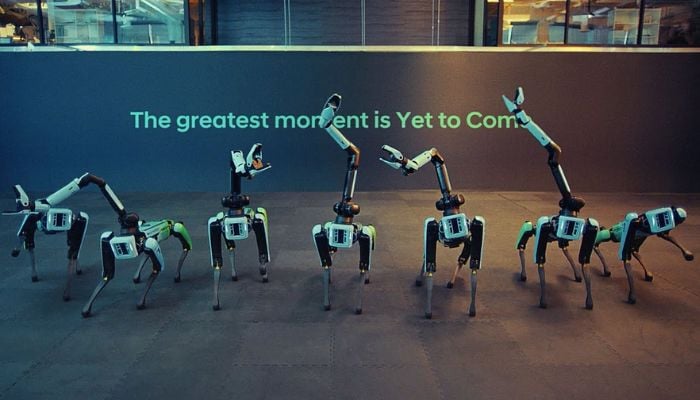 Seven robots are seen dancing to the hit song Permission to Dance by K-Pop band BTS.— YouTube