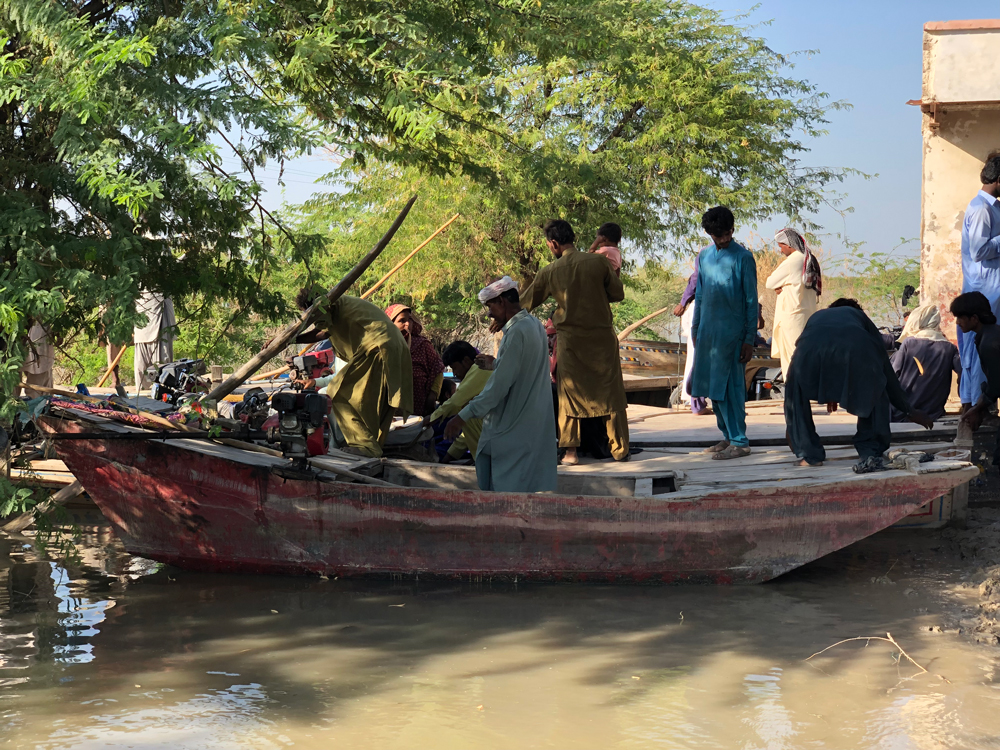 Chandhan Mori is a busy marketplace, where boatmen are making a fairly decent livelihood ferrying people to and from the nearby villages, still surrounded by water. — Photo by author