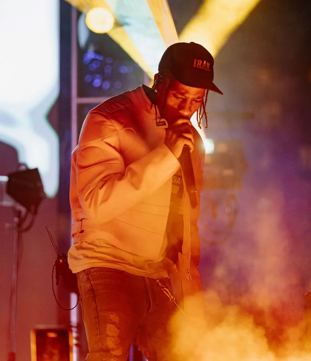 Travis Scott performing poolside at the Fontainebleau Miami Beach
