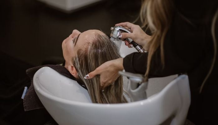 (representational) A woman getting her hair washed by a professional.— Unsplash