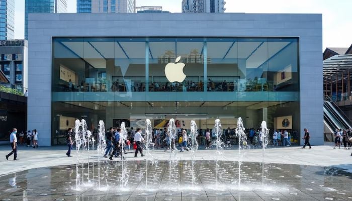 People walking pastApple Store Chengdu Sino-Ocean Taikoo Li Chengdu.— Unsplash