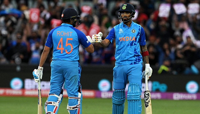 Indias KL Rahul (R) Rohit Sharma bump gloves during the ICC mens Twenty20 World Cup 2022 cricket match between India and Bangladesh at Adelaide Oval on November 2, 2022 in Adelaide. — AFP