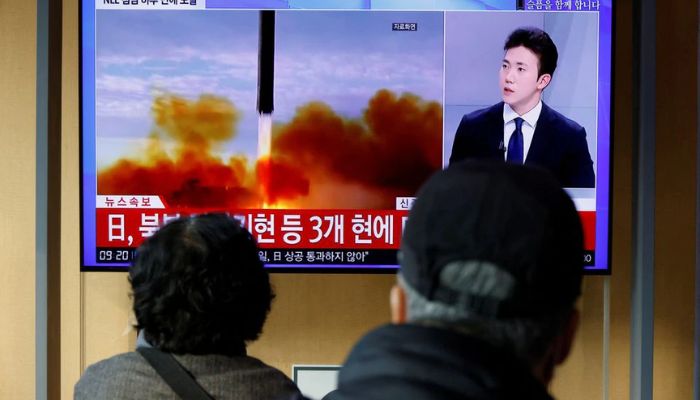 People watch a TV broadcasting a news report on North Korea firing a ballistic missile off its east coast, in Seoul, South Korea, November 3, 2022.— Reuters