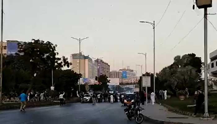 Protesters gathered at Karachis Shahrah-e-Faisal. — PTI Karachi/Twitter