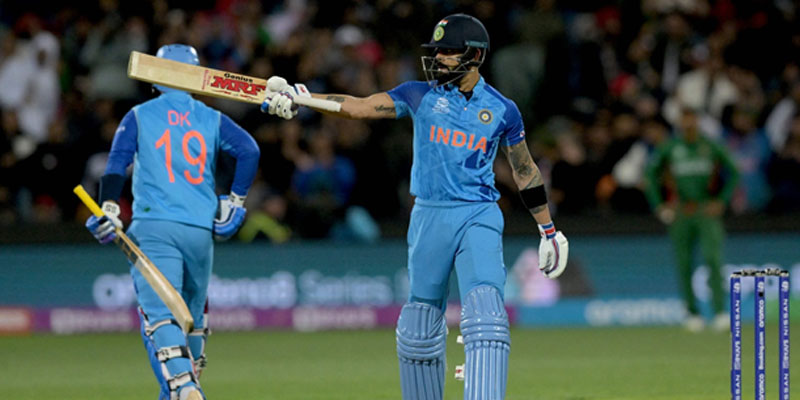 India´s Virat Kohli celebrates reaching his half-century during their Twenty20 World Cup match against India at Adelaide Oval here on Wednesday. — AFP/File
