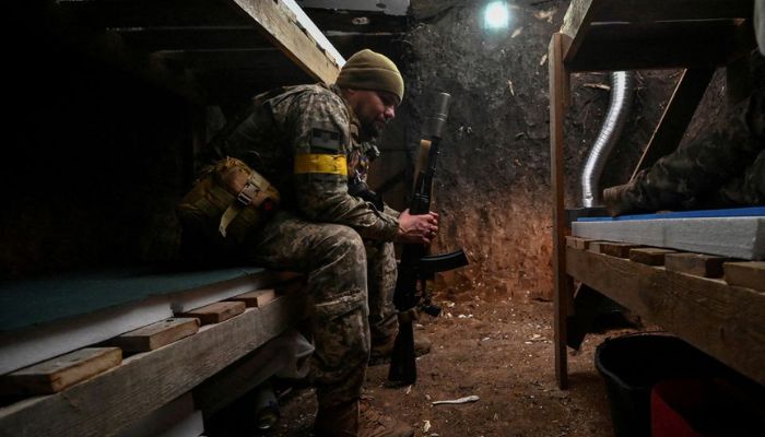 A serviceman rests in a dugout at his position on a front line, amid Russias attack on Ukraine, in Zaporizhzhia region, Ukraine November 3, 2022.— Reuters